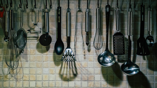 a bunch of kitchen utensils