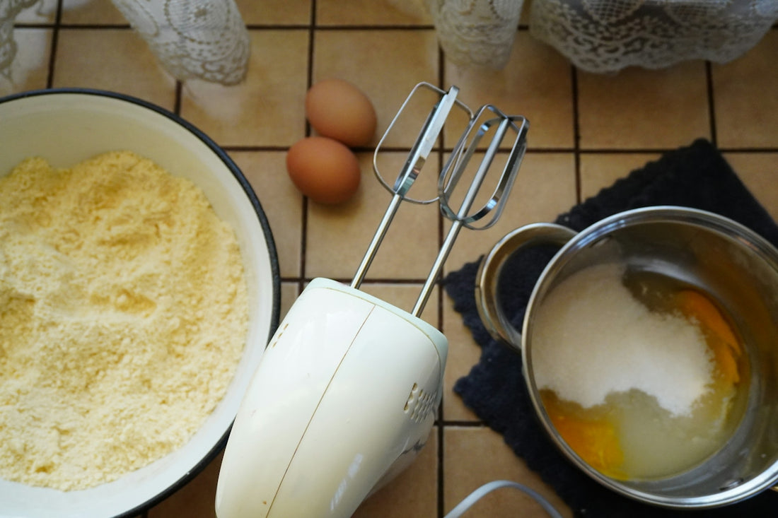Baking ingredients with eggs and electric mixer