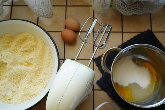 Baking ingredients with eggs and electric mixer