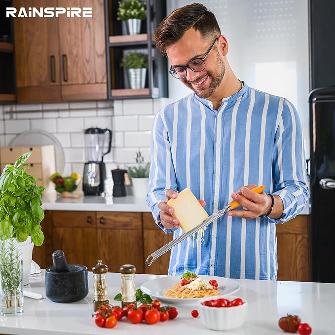 Rainspire Zester Grater with Handle, Lemon Zester Cheese Grater for Kitchen Stainless Steel, Parmesan Cheese Garlic Nutmeg Chocolate Fruits Vegetables Ginger Grater, Fine (Orange)